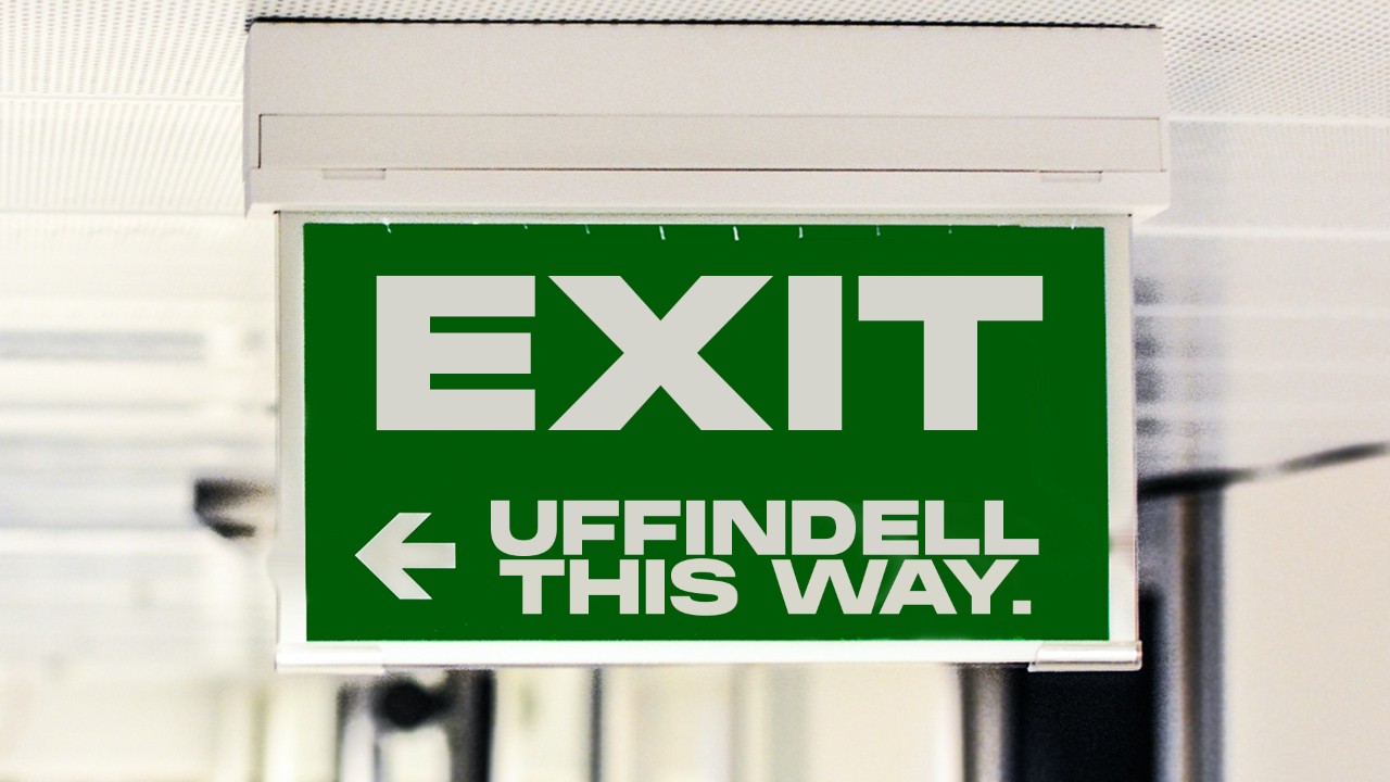 An exit sign reading Uffindell this way.